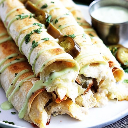 SLOW COOKER JALAPEÑO POPPER CHICKEN TAQUITOS